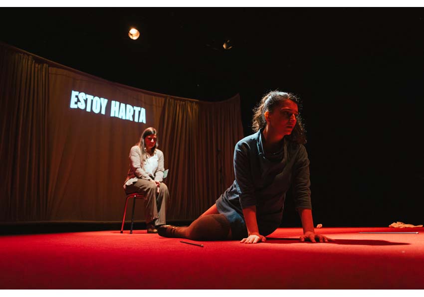 event image:Two women, one seated, the other on the floor and a sign that reads "I've had enough."
